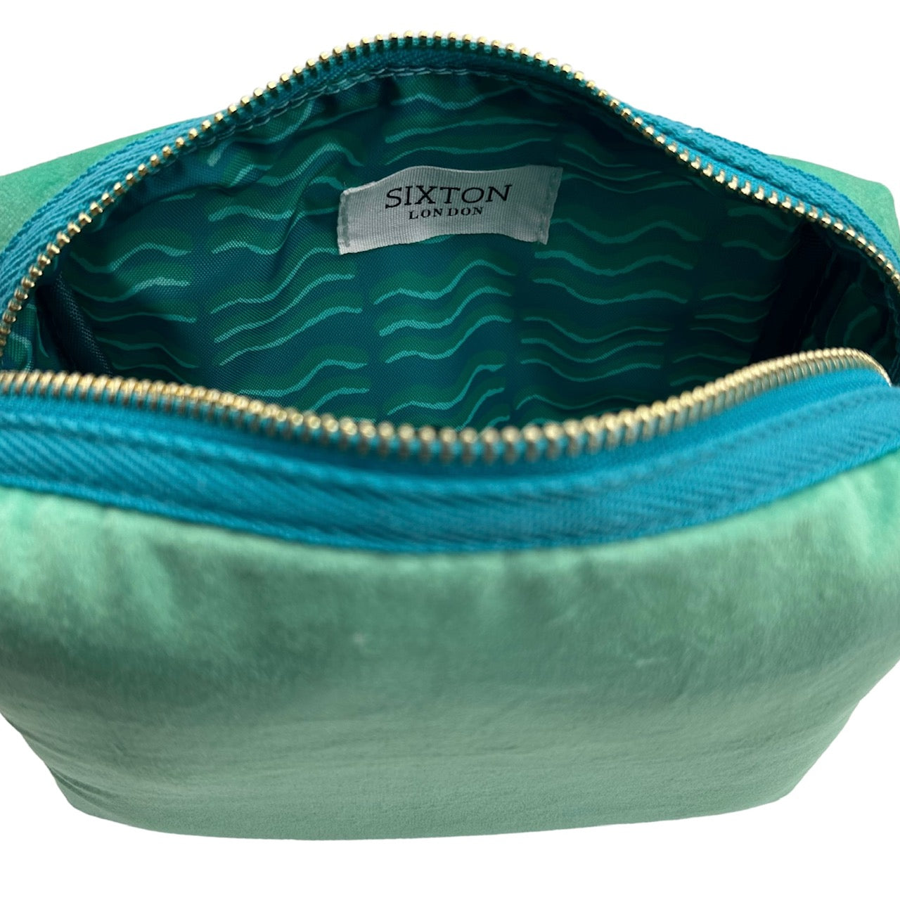 Marine makeup bag & gold palm tree brooch