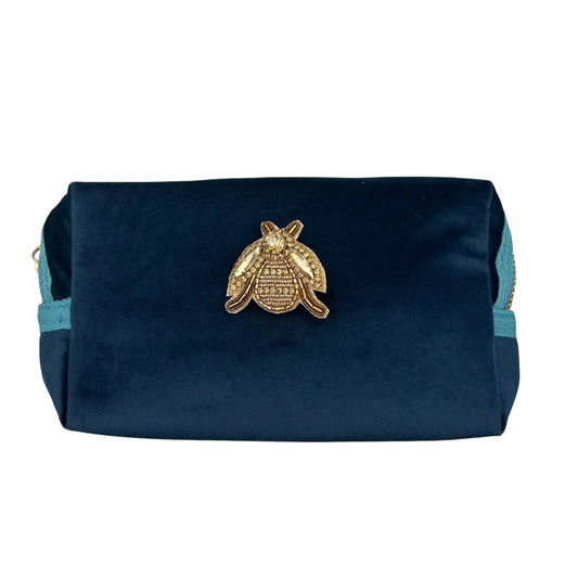 Dark blue makeup bag with Gold Jewelled Insect brooch