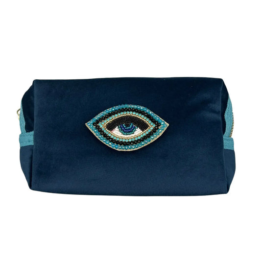 Dark blue makeup bag with Turquoise Eye brooch