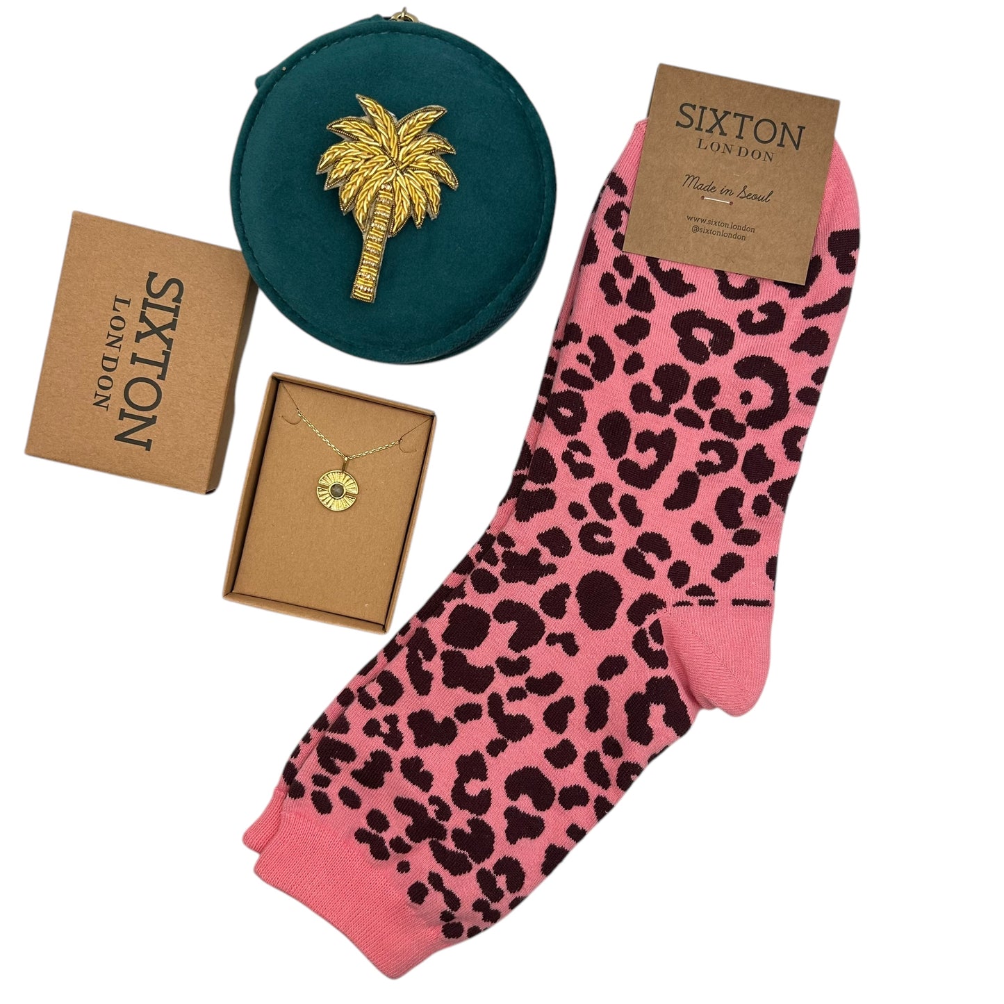 Surprise gift set - a jewellery travel pot with a brooch, pair of socks and jewellery. Over £50 worth of gifts - all for £40.00